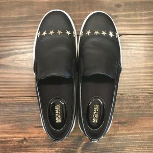 Michael Kors black slip on leather sneakers